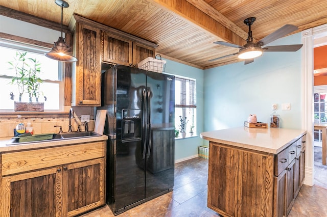 kitchen with decorative light fixtures, ceiling fan, wood ceiling, and black fridge with ice dispenser