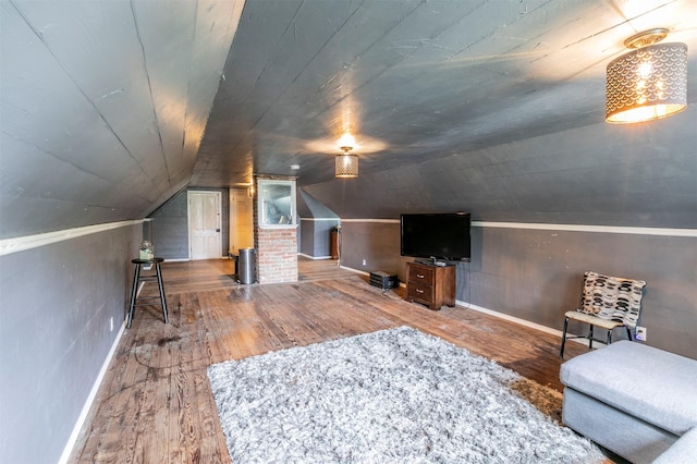 additional living space featuring wooden ceiling, baseboards, lofted ceiling, and hardwood / wood-style flooring