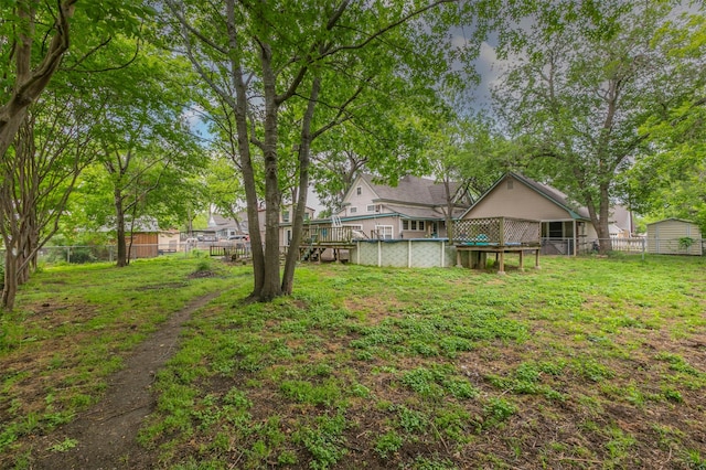 view of yard with a fenced backyard and an outdoor pool