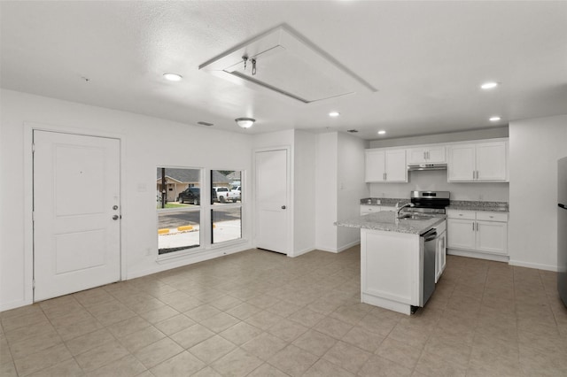 kitchen featuring baseboards, recessed lighting, under cabinet range hood, white cabinets, and appliances with stainless steel finishes
