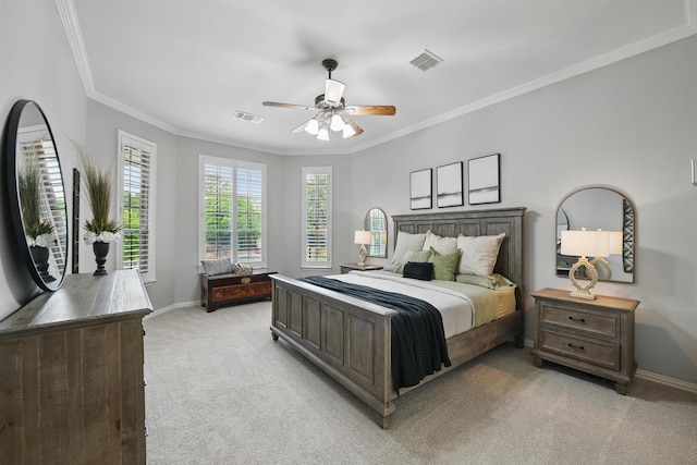bedroom with visible vents, baseboards, crown molding, and light colored carpet