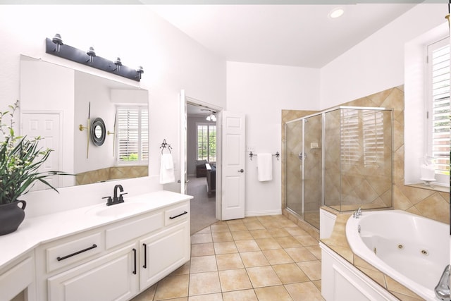 bathroom featuring vanity, tile patterned floors, a shower stall, and a jetted tub