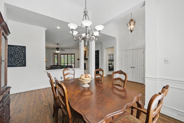 dining room featuring recessed lighting, baseboards, ceiling fan with notable chandelier, and dark wood-style floors