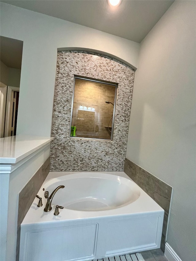 7040 Cross Point Ln, Little Elm, TX 76227 - bathroom featuring a garden tub