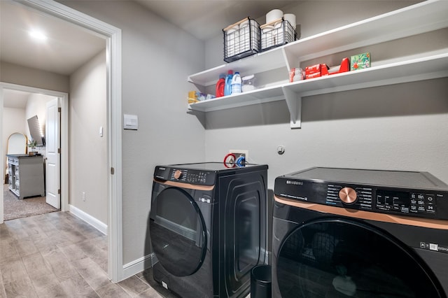 1349 Rolling Meadows Dr, Cedar Hill, TX 75104 - laundry area with baseboards, laundry area, washer and dryer, and wood finished floors