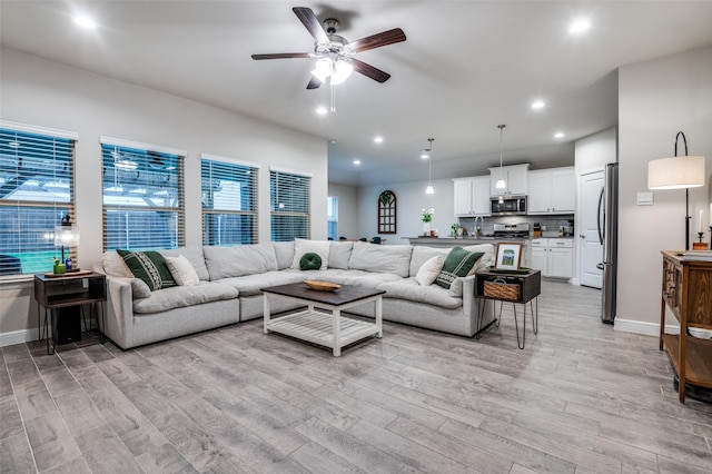 1349 Rolling Meadows Dr, Cedar Hill, TX 75104 - living area with light wood finished floors, baseboards, a ceiling fan, and recessed lighting