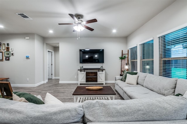 1349 Rolling Meadows Dr, Cedar Hill, TX 75104 - living room featuring wood finished floors, visible vents, recessed lighting, a ceiling fan, and baseboards