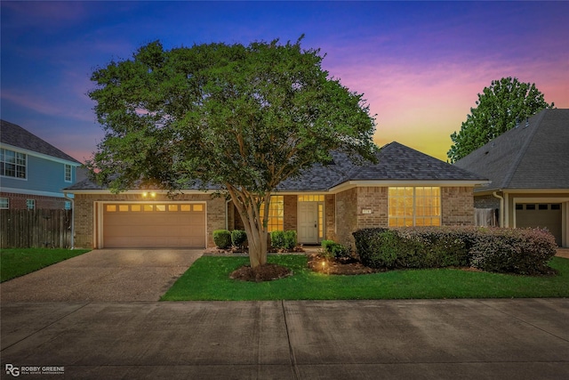 174 Hallette Dr, Shreveport, LA 71115 - ranch-style house featuring brick siding, fence, an attached garage, a shingled roof, and concrete driveway