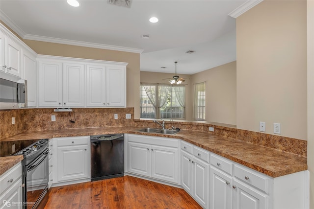 174 Hallette Dr, Shreveport, LA 71115 - kitchen featuring white cabinetry, wood finished floors, black appliances, and a sink