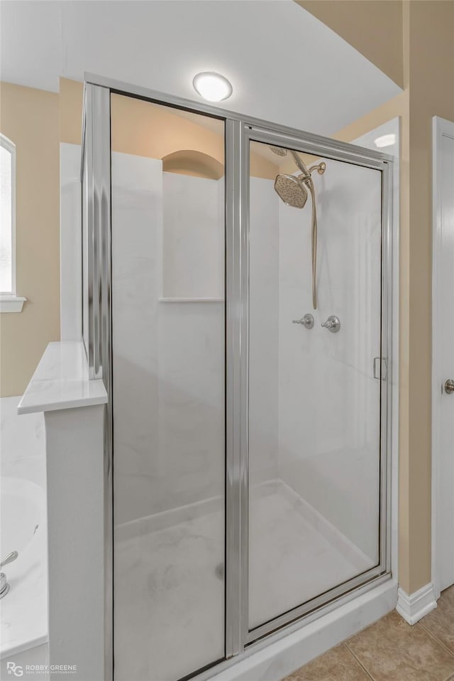 174 Hallette Dr, Shreveport, LA 71115 - bathroom with a stall shower and tile patterned flooring