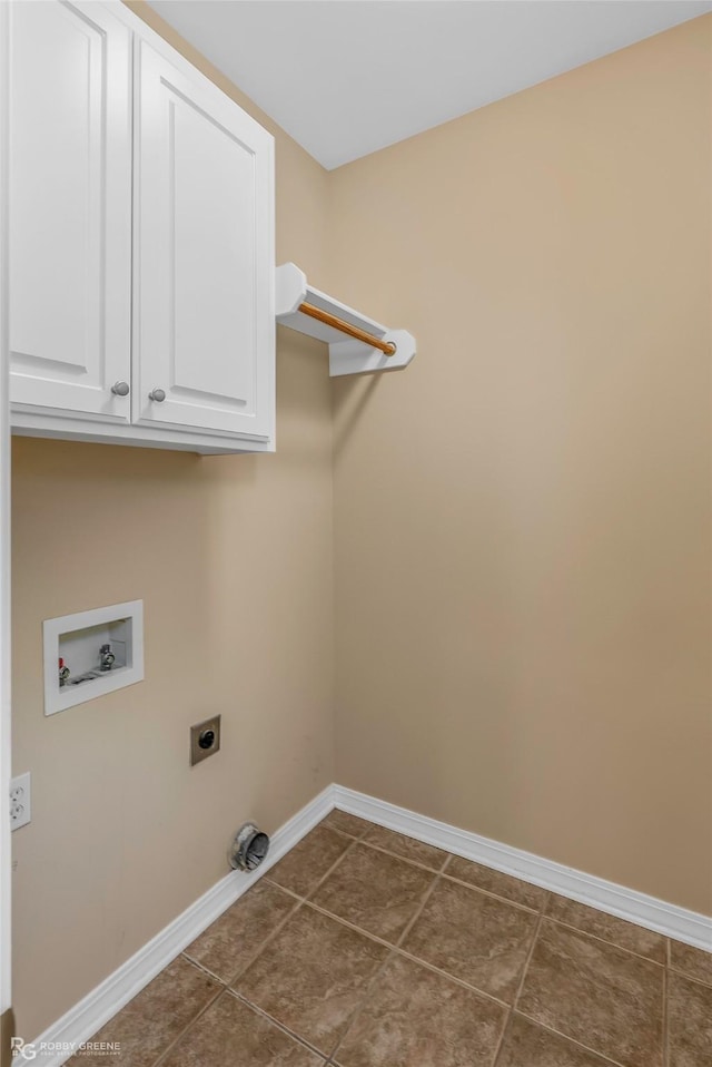 174 Hallette Dr, Shreveport, LA 71115 - clothes washing area with cabinet space, dark tile patterned floors, electric dryer hookup, baseboards, and hookup for a washing machine