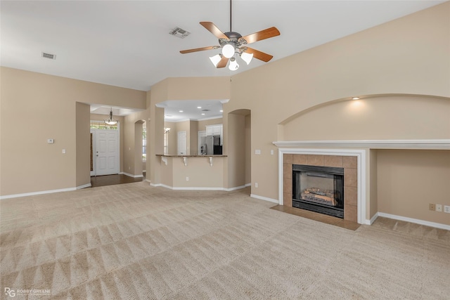 174 Hallette Dr, Shreveport, LA 71115 - unfurnished living room with visible vents, a fireplace, ceiling fan, and carpet floors
