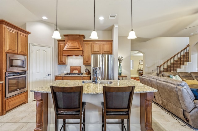 2828 Mariposa Dr, Grand Prairie, TX 75054 - dining space featuring a barn door, arched walkways, lofted ceiling, recessed lighting, and baseboards