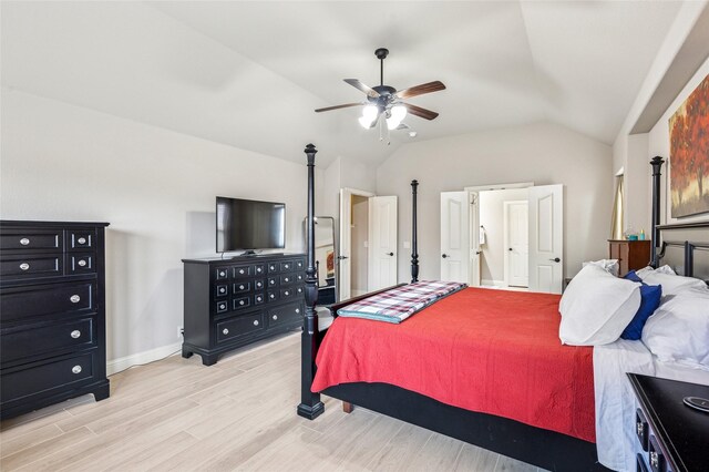 2828 Mariposa Dr, Grand Prairie, TX 75054 - bedroom featuring light wood-style floors, vaulted ceiling, a ceiling fan, and baseboards