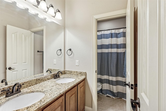 2828 Mariposa Dr, Grand Prairie, TX 75054 - bedroom featuring a closet, vaulted ceiling, ceiling fan, and baseboards