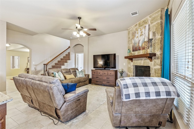 2828 Mariposa Dr, Grand Prairie, TX 75054 - dining space featuring arched walkways, baseboards, a ceiling fan, and a chandelier