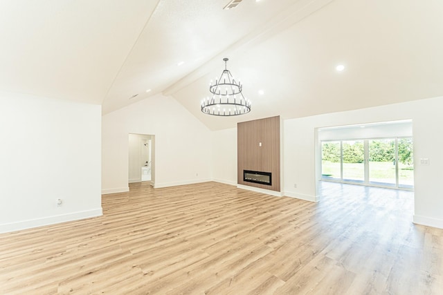 229 W Oaks Cir, Sulphur Springs, TX 75482 - unfurnished living room featuring a chandelier, light wood-type flooring, baseboards, high vaulted ceiling, and a fireplace