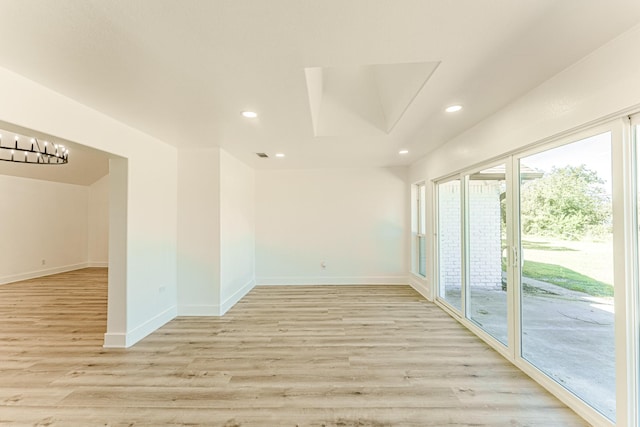 229 W Oaks Cir, Sulphur Springs, TX 75482 - empty room featuring light wood-style floors, recessed lighting, and baseboards