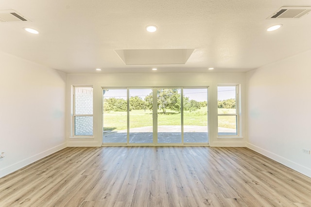 229 W Oaks Cir, Sulphur Springs, TX 75482 - spare room with baseboards, wood finished floors, and recessed lighting