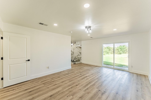 229 W Oaks Cir, Sulphur Springs, TX 75482 - empty room featuring light wood-style floors, baseboards, and recessed lighting