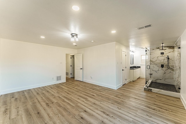 229 W Oaks Cir, Sulphur Springs, TX 75482 - spare room featuring light wood finished floors, baseboards, and recessed lighting
