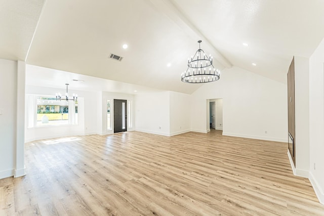 229 W Oaks Cir, Sulphur Springs, TX 75482 - unfurnished living room with a chandelier, light wood finished floors, and baseboards