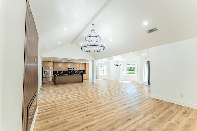 229 W Oaks Cir, Sulphur Springs, TX 75482 - unfurnished living room with a chandelier, light wood-style floors, baseboards, high vaulted ceiling, and beamed ceiling