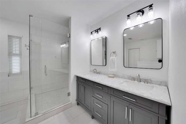 2227 Timberwood, Carrollton, TX 75006 - full bath featuring a sink, double vanity, a shower stall, and tile patterned flooring