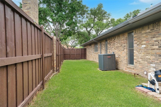 2227 Timberwood, Carrollton, TX 75006 - view of yard with central AC and a fenced backyard