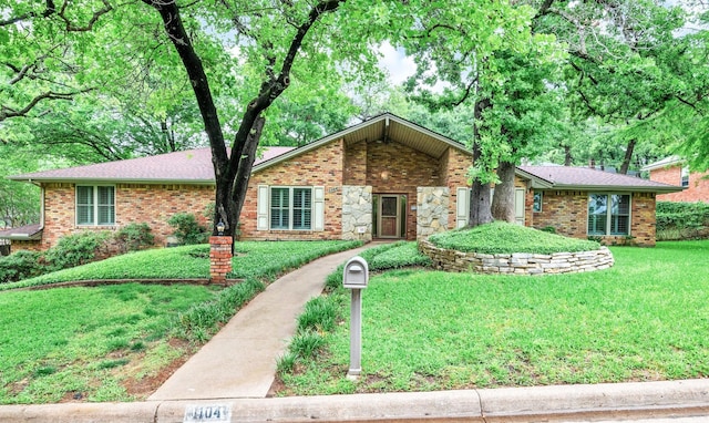 1104 Edgecliff Dr, Bedford, TX 76022 - single story home with a front yard and brick siding