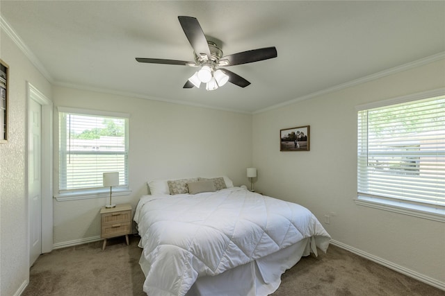 5921 Springbrook Dr, Tyler, TX 75707 - carpeted bedroom with ceiling fan, baseboards, and ornamental molding