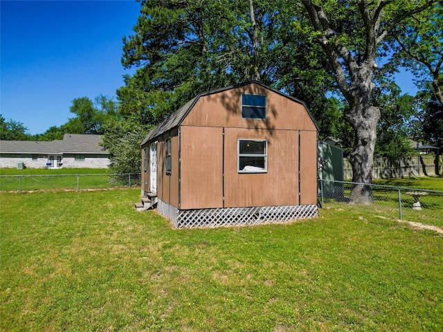 5921 Springbrook Dr, Tyler, TX 75707 - view of outdoor structure featuring entry steps, an outbuilding, and a fenced backyard