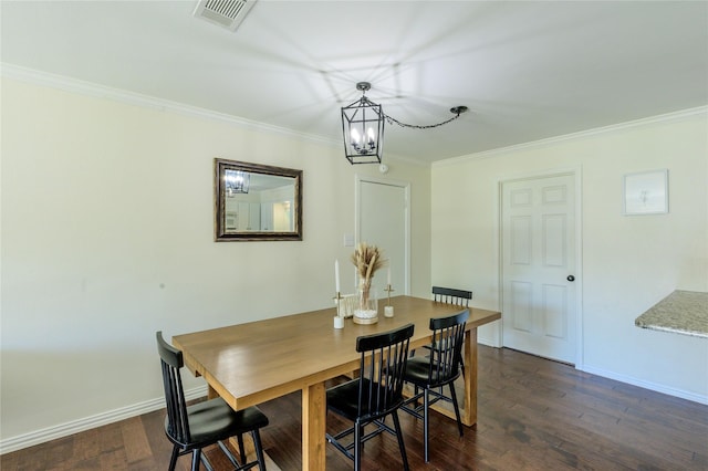 5921 Springbrook Dr, Tyler, TX 75707 - dining space with ornamental molding, visible vents, a chandelier, dark wood-style floors, and baseboards