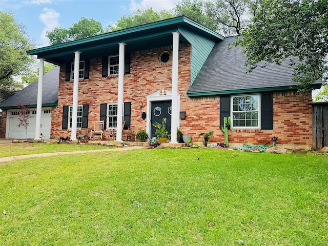 neoclassical home with a front lawn, brick siding, roof with shingles, and an attached garage