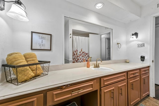 bathroom featuring vanity and visible vents