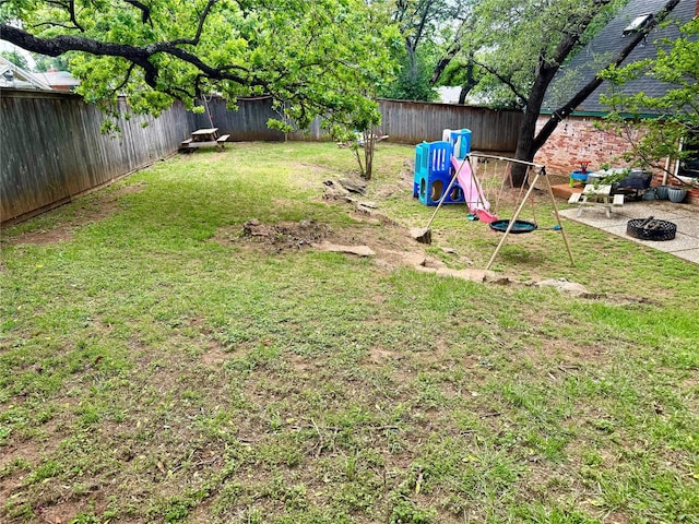 view of yard with a fenced backyard