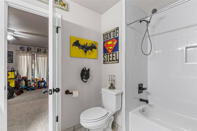 1105 Charles St, Weatherford, TX 76086 - full bathroom with toilet, ceiling fan, shower / bathtub combination, baseboards, and a textured ceiling