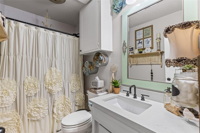 1105 Charles St, Weatherford, TX 76086 - full bathroom featuring toilet, vanity, and curtained shower