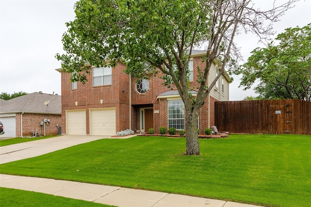 view of front of home with driveway, brick siding, a garage, and fence