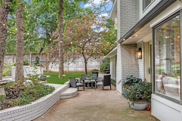 view of patio with fence