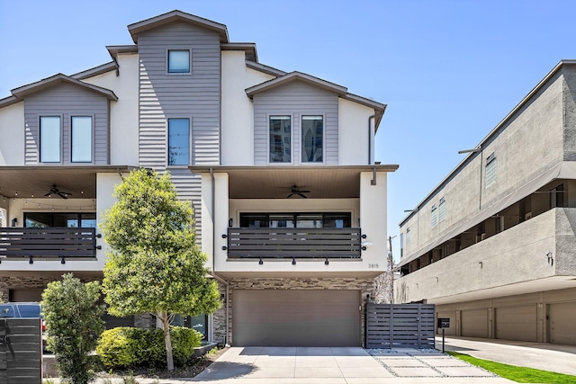 3815 Throckmorton St, Dallas, TX 75219 - view of front facade featuring a balcony, ceiling fan, a garage, and concrete driveway