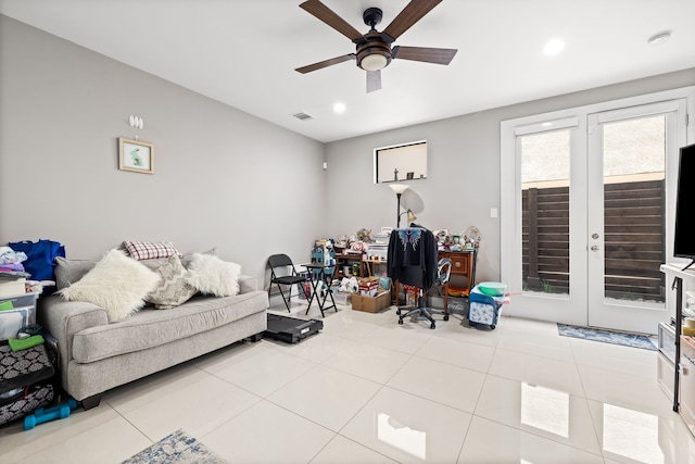 living area featuring a ceiling fan, tile patterned flooring, and recessed lighting