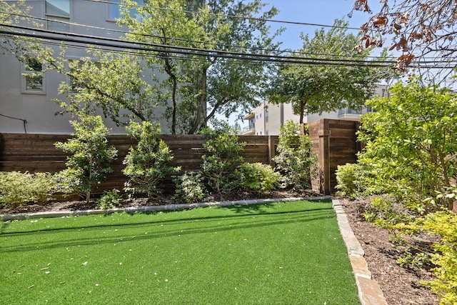 view of yard featuring fence