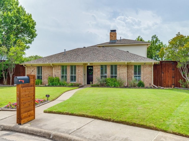 17607 Seedling Ct, Dallas, TX 75287 - traditional-style house with a chimney, brick siding, and roof with shingles