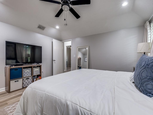 17607 Seedling Ct, Dallas, TX 75287 - bedroom with light wood-type flooring, recessed lighting, ceiling fan, lofted ceiling, and baseboards