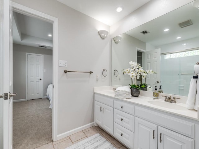 17607 Seedling Ct, Dallas, TX 75287 - full bath featuring double vanity, baseboards, recessed lighting, and tile patterned flooring