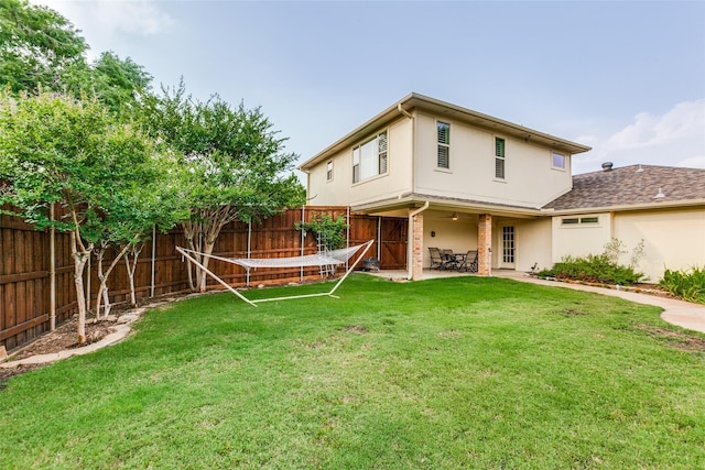 17607 Seedling Ct, Dallas, TX 75287 - rear view of house featuring stucco siding and a patio area