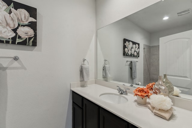 1261 Altuda Dr, Forney, TX 75126 - bathroom with recessed lighting, walk in shower, vanity, and visible vents