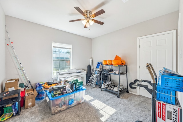 recreation room featuring ceiling fan and carpet floors