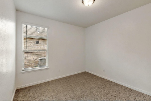 9133 Copper Crossing Dr, Fort Worth, TX 76131 - carpeted empty room featuring plenty of natural light and baseboards